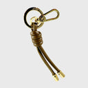 Abro Dalia Taschenanhänger aus olivfarbenem Leder mit Knotenoptik und goldfarbenem Karabiner