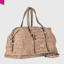 Cromia Louise Handtasche in Kroko-Optik aus weichem Leder, schräg fotografiert
